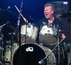 A photo of John JR Robinson behind the drums