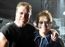 A photo of John JR Robinson and Elton John