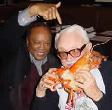 A photo of Toots Thielemans and Quincy Jones