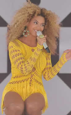 A photo of Beyonce singing