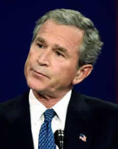 A photo of George W. Bush listening