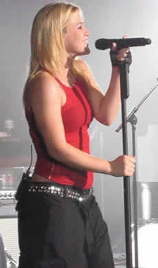 A photo of Kelly Clarkson Singing